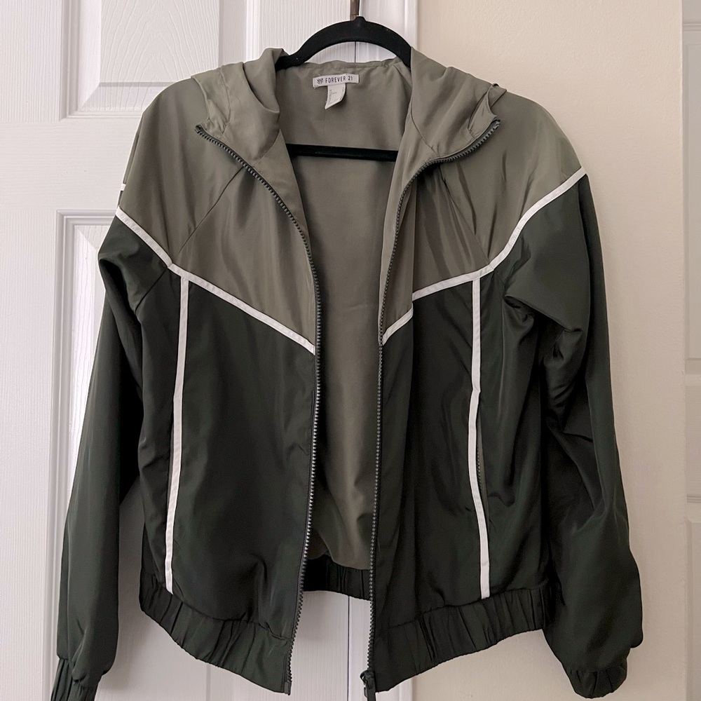 olive/dark green windbreaker